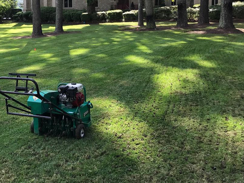 Aurora property getting serviced for lawn aeration